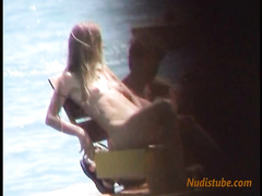 Nudist youth having fun with friends