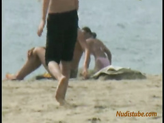 Spying after topless women on the beach