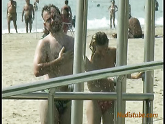 Spying after topless women on the beach