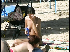 Topless girls on public beach