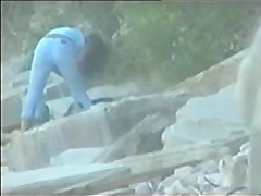 teen couple caught on the beach