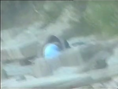 teen couple caught on the beach