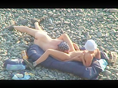 Voyeur on public beach. Oral sex
