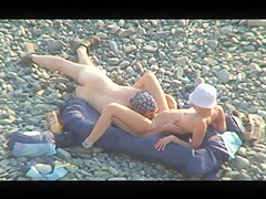 Voyeur on public beach. Oral sex