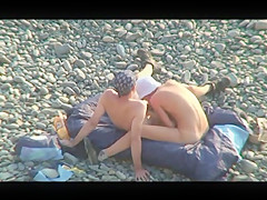 Voyeur on public beach. Oral sex