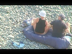 Voyeur on public beach. Oral sex