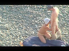 Voyeur on public beach. Oral sex