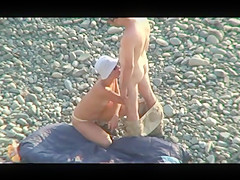 Voyeur on public beach. Oral sex