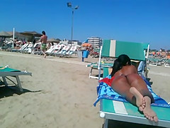 Perfect round latin ass on the beach