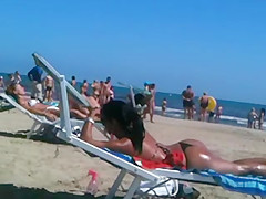 Perfect round latin ass on the beach