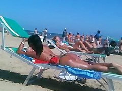 Perfect round latin ass on the beach