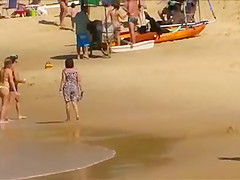 Powerful zoom in thong bikini girl !