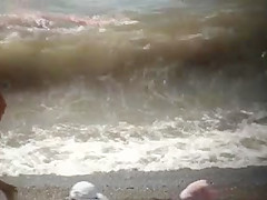 CHECK OUT THIS BLONDE WITH TIGHT BODY ENJOYS THE BEACH.