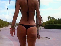 Beautiful girl with small bikini thong !