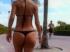 Beautiful girl with small bikini thong !