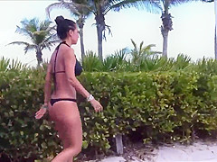 Beautiful girl with small bikini thong !