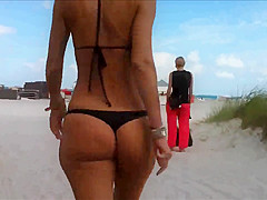 Beautiful girl with small bikini thong !