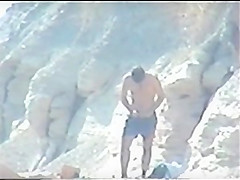 Shy couple caught on the nudist beach