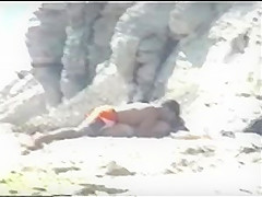 Shy couple caught on the nudist beach