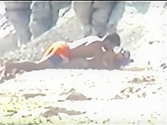 Shy couple caught on the nudist beach