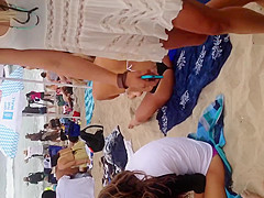 Blonde black thong on beach