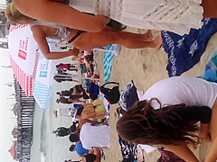 Blonde black thong on beach