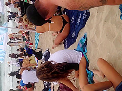 Blonde black thong on beach