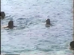 Beach candid topless from 1990