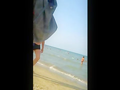 cute sexy girl in red bikini on the beach