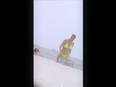 kinda hot beach chick, spy 35 jiggly tits,, kinda see thru