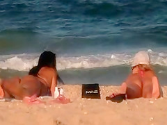 two Latin ass on the beach