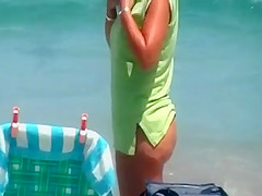 sexy mature thong bikini with NOT her daughter on beach 2014