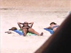 huge jiggly beach boobs caught lotioning