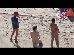 Voyeur on public beach. Group sex before spectators