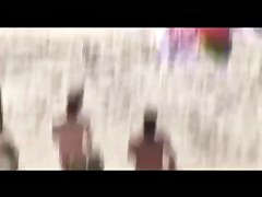 Voyeur on public beach. Group sex before spectators