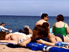 Young topless teens on Barcelona spanish beach