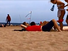 Young topless teens on Barcelona spanish beach