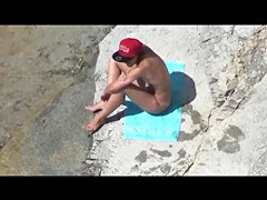 The couple was caught while masturbating on public beach