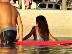Ooops, Hot Hawaiian girl wedgie after surfing in Honolulu.