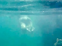 Nudists in the Crimea in 2011. Underwater girl.1
