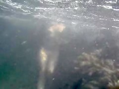 Nudists in the Crimea in 2011. Underwater girl.1