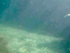 Nudists in the Crimea in 2011. Underwater girl.1