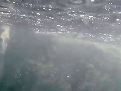 Nudists in the Crimea in 2011. Underwater girl.1