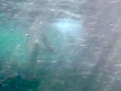 Nudists in the Crimea in 2011. Underwater girl.1