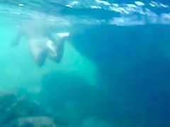 Nudists in the Crimea in 2011. Underwater girl.1