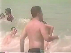 Topless teen girl - beach video