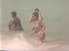 Topless teen girl - beach video