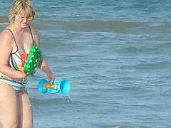 chubby mom spied on the beach
