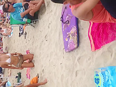 Big boob Asian on the beach