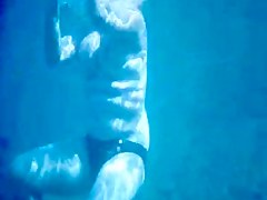 Topless thick MILF under the water for voyeurs